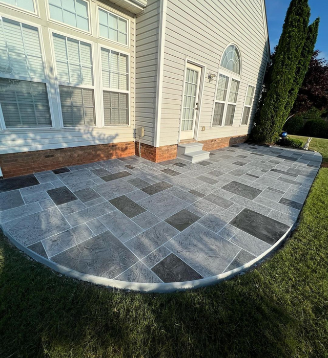 Stamped grey concrete patio resurfacing
