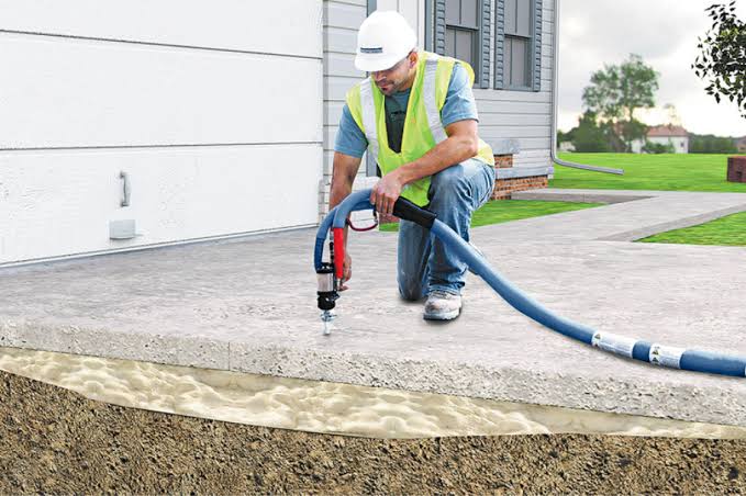Polyurethane foam injection along a driveway edge
