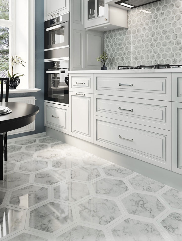 Hexagon Carrara and Thassos marble mosaic floor in a modern kitchen